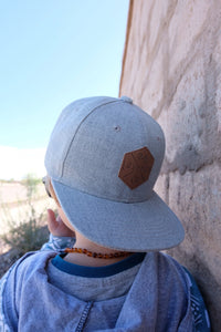 Light gray toddler and kids snapback baseball cap with faux leather logo patch, great cap for babies and toddlers!