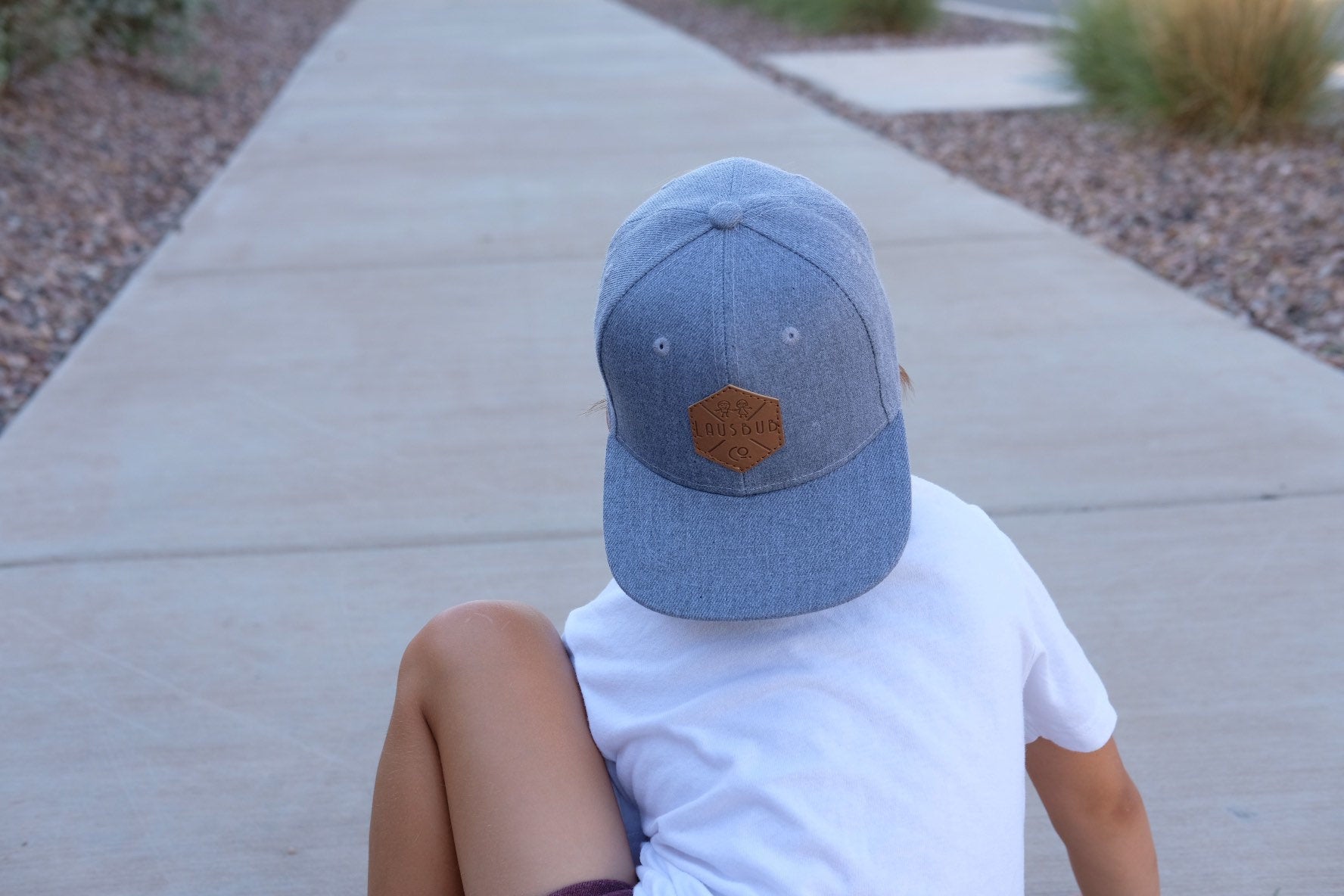 Dark gray toddler and kids snapback baseball cap with faux leather logo patch, great cap for babies and toddlers!